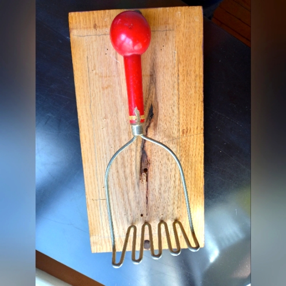 Chippy red paint potato masher